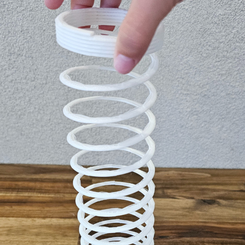 Slinky That Stretches, Bounces, and Goes Downstairs!